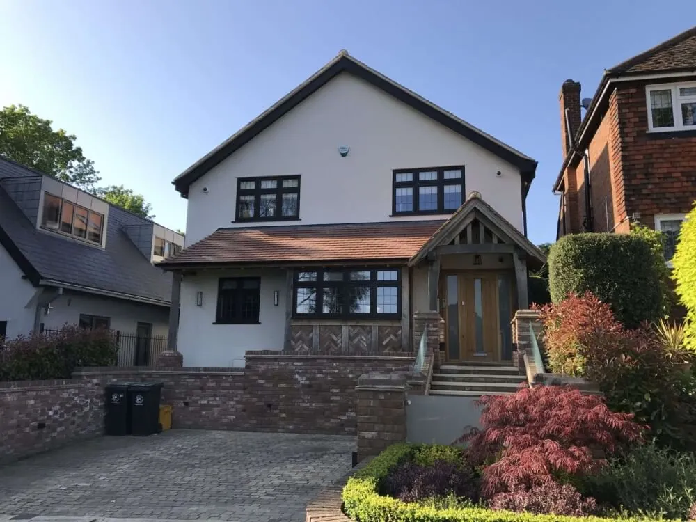 Completed bungalow-to-house project in Loughton